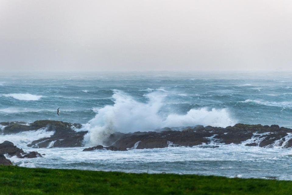 Waves crashing onto the rocks in Bantry Bay West Cork, after Storm Barra hit the UK and Ireland with disruptive winds, heavy rain and snow (Andy Gibson/PA) (PA Wire)