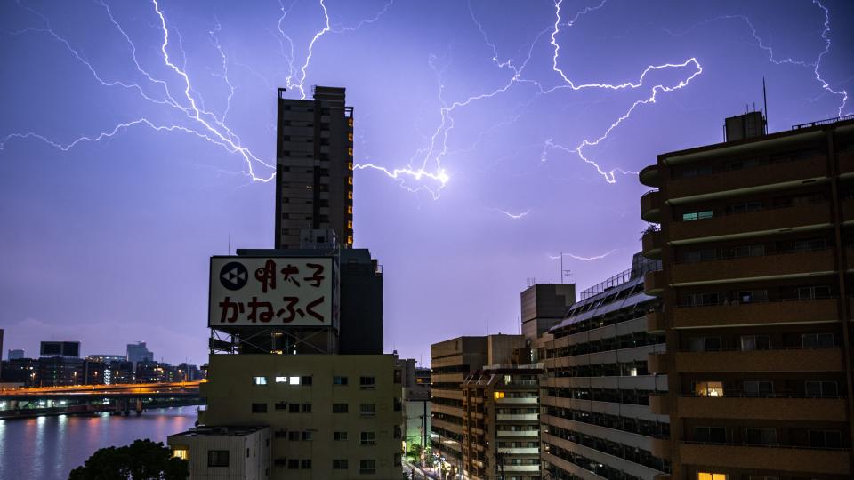 Lightning strikes over Tokyo early on July 4, 2023. (Photo by Philip FONG / AFP) (Photo by PHILIP FONG/AFP via Getty Images)
