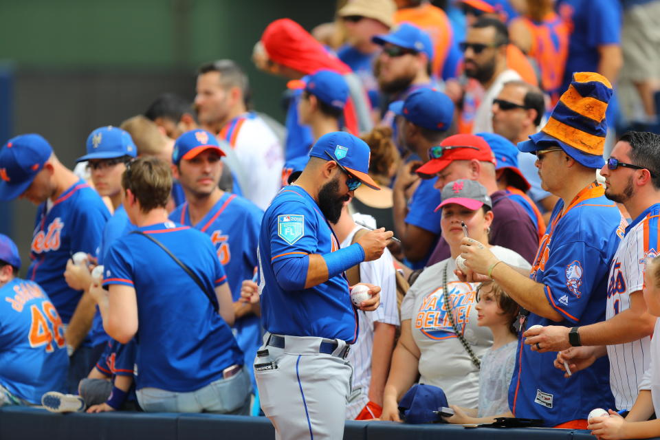 <p>New York Mets minor leaguer Luis Guillorme signs for fans before the baseball game against the Houston Astros at the Ballpark of the Palm Beaches in West Palm Beach, Fla., on Feb. 26, 2018. (Photo: Gordon Donovan/Yahoo News) </p>