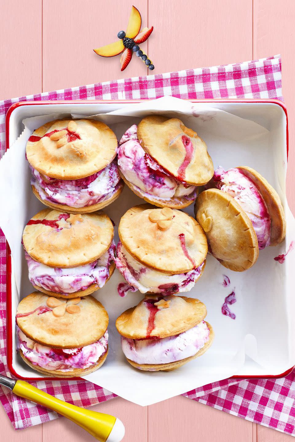 <p>Your kids will love these "piewiches" made with fresh raspberries, blueberries, strawberries, and vanilla ice cream. </p><p><strong><a rel="nofollow noopener" href="https://www.womansday.com/food-recipes/food-drinks/recipes/a59001/fresh-berry-ice-cream-piewiches-recipe/" target="_blank" data-ylk="slk:Get the recipe.;elm:context_link;itc:0;sec:content-canvas" class="link ">Get the recipe.</a></strong></p>