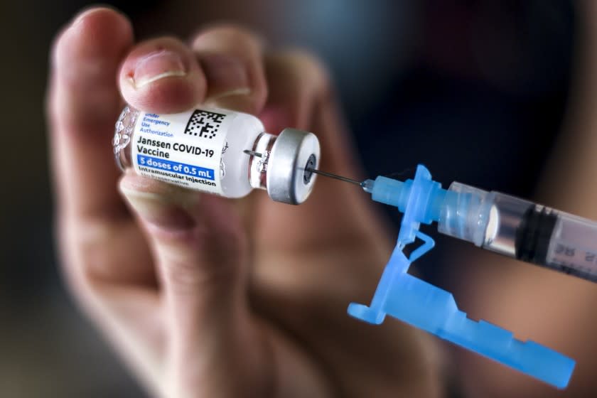 THORNTON, CO - MARCH 06: Adams 12 Five Star Schools District RN Tiffany Karschamroon draws a dose from a vial of the Johnson & Johnson COVID-19 vaccine, the newest vaccine approved by the U.S. FDA for emergency use, at an event put on by the Thornton Fire Department on March 6, 2021 in Thornton, Colorado. Colorado entered COVID-19 vaccination Phase 1B.3 on Friday, allowing essential grocery and agriculture workers, people over the age of 60 and people with two or more high-risk conditions to receive a vaccine. (Photo by Michael Ciaglo/Getty Images)