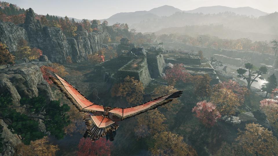 A Ronin takes flight over a small enemy encampment using an orange glider