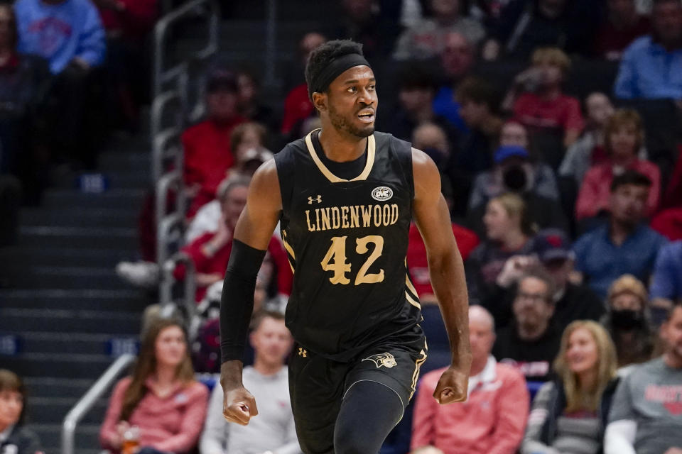 Lindenwood's Remy Lemovou reacts after scoring during the first half of the team's NCAA college basketball game against Dayton, Monday, Nov. 7, 2022, in Dayton, Ohio. (AP Photo/Jeff Dean)