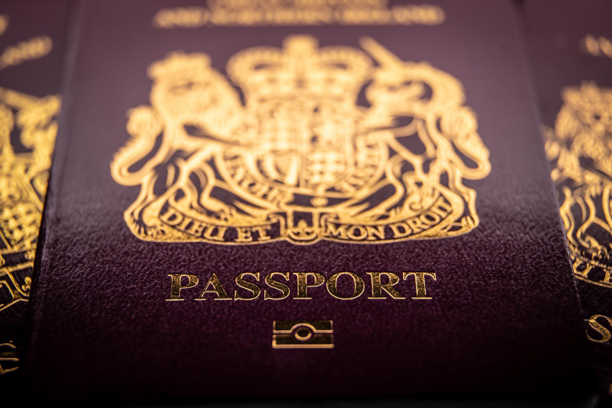 BRISTOL, UNITED KINGDOM - MARCH 13: In this photo illustration a European Union issued United Kingdom passport is photographed on March 13, 2022 in Bristol, England. Since the UK's departure from the European Union the list of countries that holders of UK issued passports can travel visa free has declined. (Photo by Matt Cardy/Getty Images)