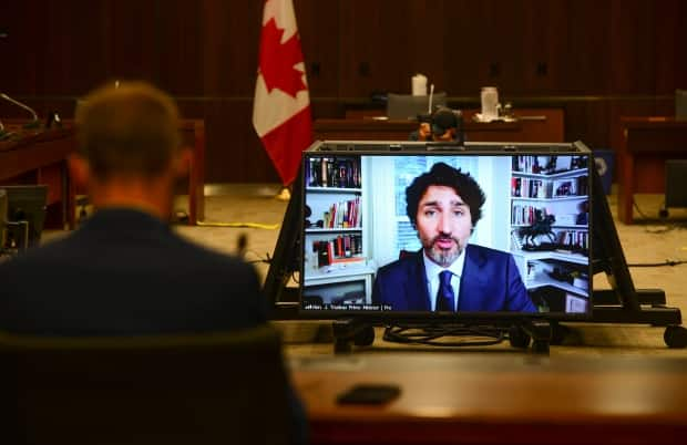 The WE controversy that has been dogging the Liberals is expected to continue to follow Prime Minister Justin Trudeau and his government after Trudeau's appearance before a House of Commons committee Thursday. Prime Minister Justin Trudeau appears as a witness via videoconference during a House of Commons finance committee in the Wellington Building on Thursday, July 30, 2020. (Sean Kilpatrick/The Canadian Press - image credit)