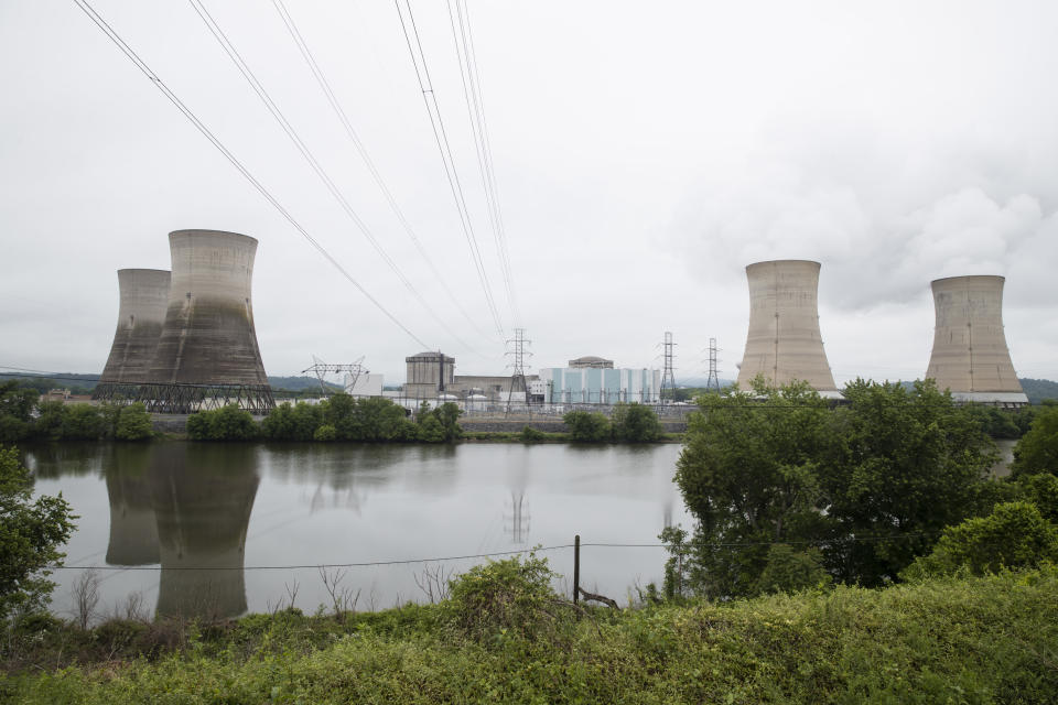 FILE - In this May 22, 2017 file photo shown is the Three Mile Island nuclear power plant in Middletown, Pa. With nuclear power plant owners seeking a rescue in Pennsylvania, a number of state lawmakers are signaling that they are willing to help, with conditions. Giving nuclear power plants what opponents call a bailout could mean a politically risky vote to hike electric bills. (AP Photo/Matt Rourke, File)