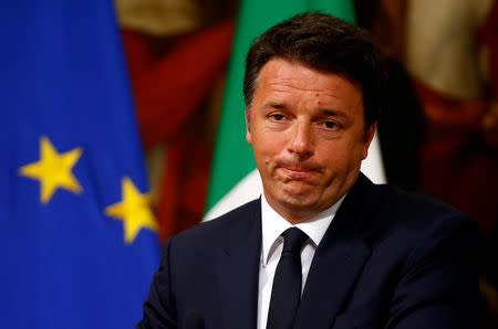 Italy Prime Minister Matteo Renzi makes a face as he talks during a news conference at Chigi Palace in Rome, Italy June 20, 2016. REUTERS/Tony Gentile