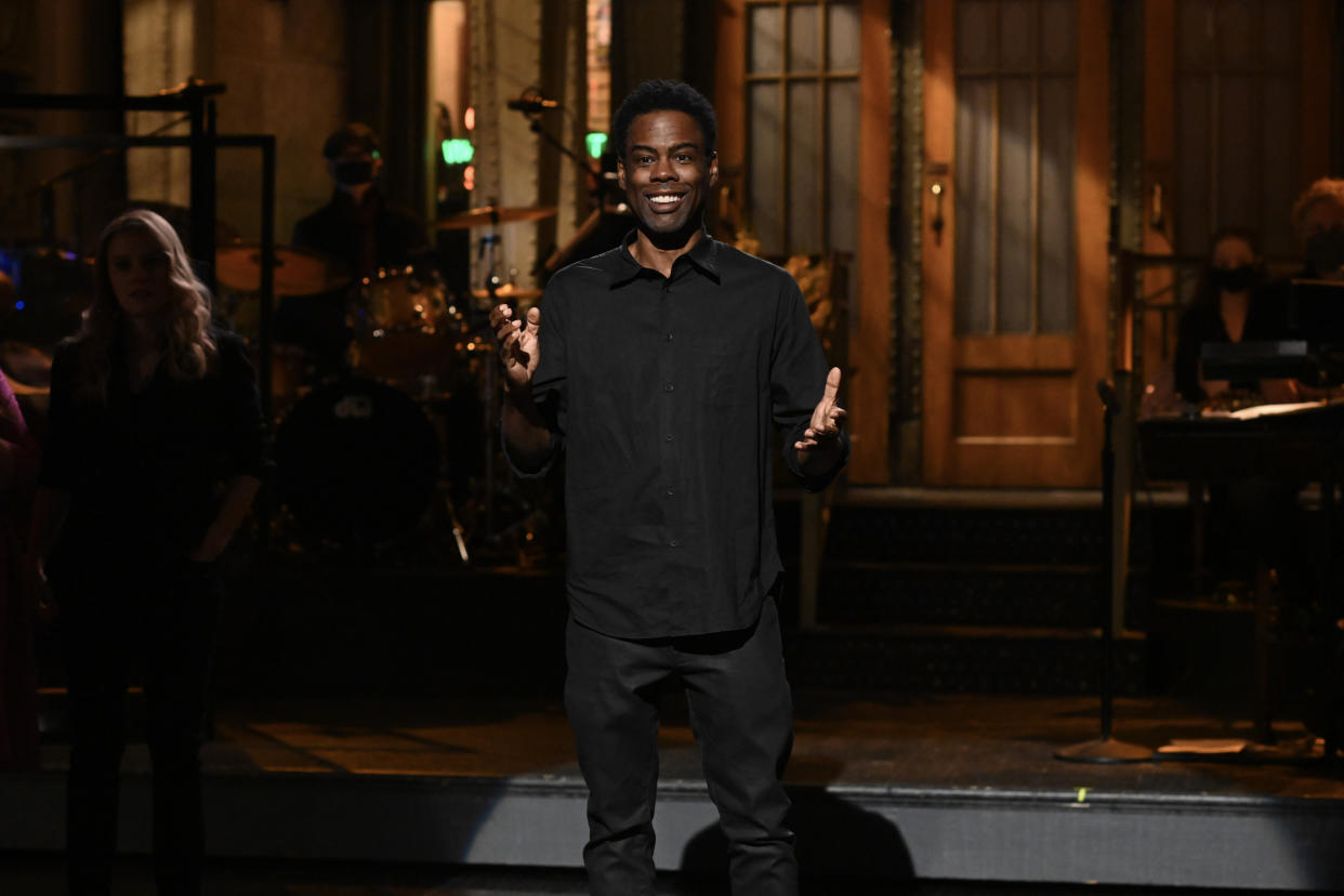 Chris Rock, appearing on Saturday Night Live in May, has COVID-19. (Photo: Will Heath/NBC/NBCU Photo Bank via Getty Images)