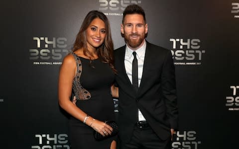 Leo Messi and wife Antonella - Credit: PA