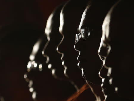 Monks from Buddhist organization Bodu Bala Sena attend a speech by Ashin Wirathu at a BBS convention in Colombo, September 28, 2014. REUTERS/Dinuka Liyanawatte