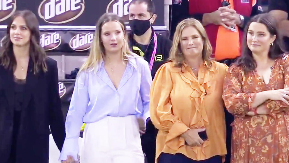 Danny 'Spud' Frawley's family (pictured) become emotional during a tribute to the St Kilda great at Marvel stadium.