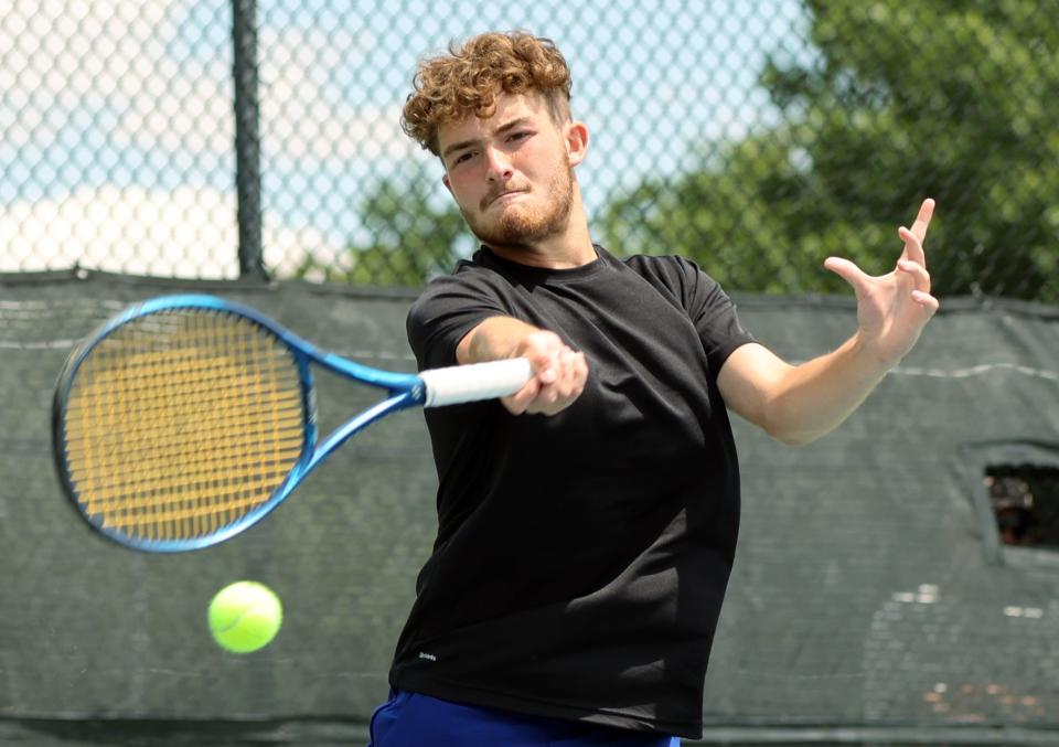 Guthrie's Carson Holmstead returns a ball as he and partner Lane Goode play Carl Albert's Ben Sutterfield and Jake Farley during the State Tennis Tournament on May 10, 2024; [Oklahoma City], [Okla], [USA]; at OKC Tennis Center. Mandatory Credit: Steve Sisney-The Oklahoman