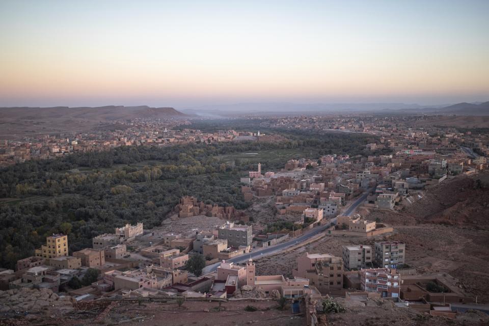 The sun sets over Tinghir, considered a gateway for southeastern Morocco and the desert region, Tuesday, Nov. 29, 2022. (AP Photo/Mosa'ab Elshamy)