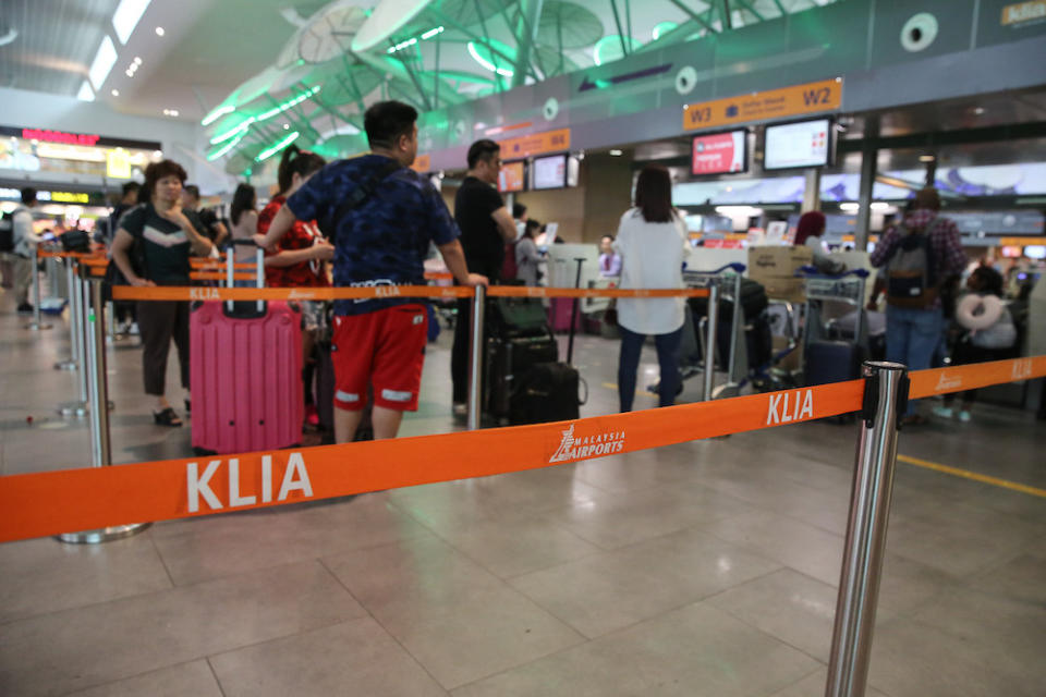 Passengers are seen at KLIA2 in Sepang August 22, 2019, during a systems outage. — Picture by Yusof Mat Isa