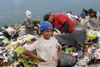 Honduras is one of the poorest Latin American countries and thousands of young scavengers are forced to search for food amid the garbage near Tegucigalpa