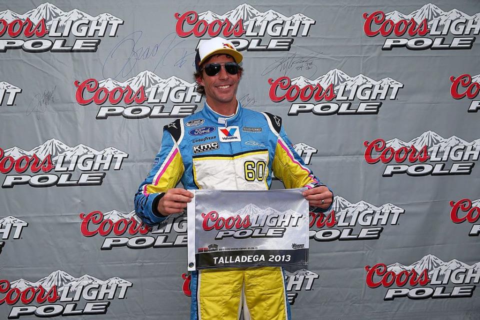 talladega, al may 03 travis pastrana, driver of the 60 roush fenway racing ford, poses with his pole award after qualifying firist for the nascar nationwide series aarons 312 at talladega superspeedway on may 3, 2013 in talladega, alabama photo by tom penningtongetty images