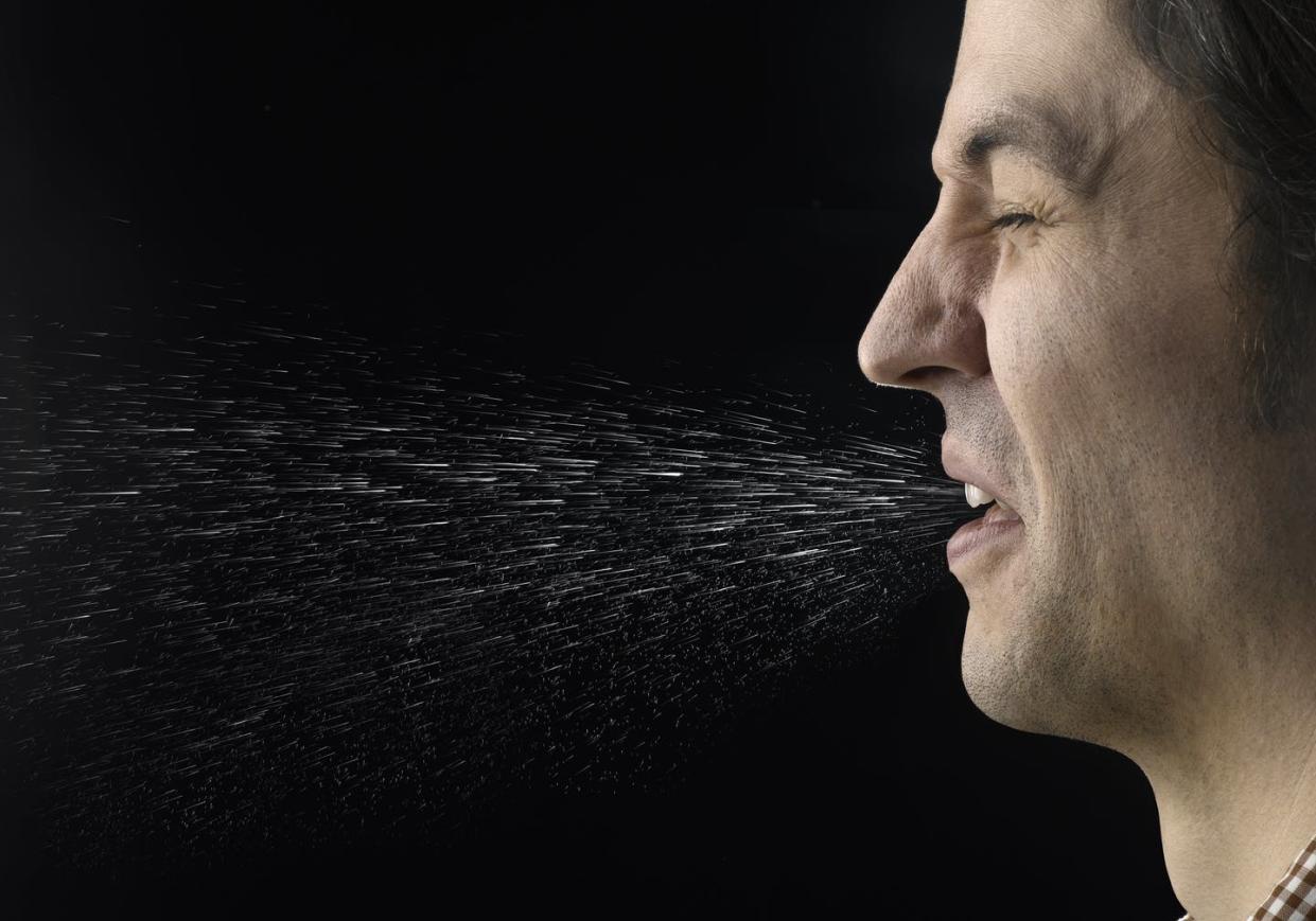 <span class="caption">Aerosols are made up of tiny respiratory droplets suspended in the air.</span> <span class="attribution"><a class="link " href="http://gettyimages.com/detail/photo/man-sneezing-royalty-free-image/94989536" rel="nofollow noopener" target="_blank" data-ylk="slk:Jeffrey Coolidge via Getty Images;elm:context_link;itc:0;sec:content-canvas">Jeffrey Coolidge via Getty Images</a></span>