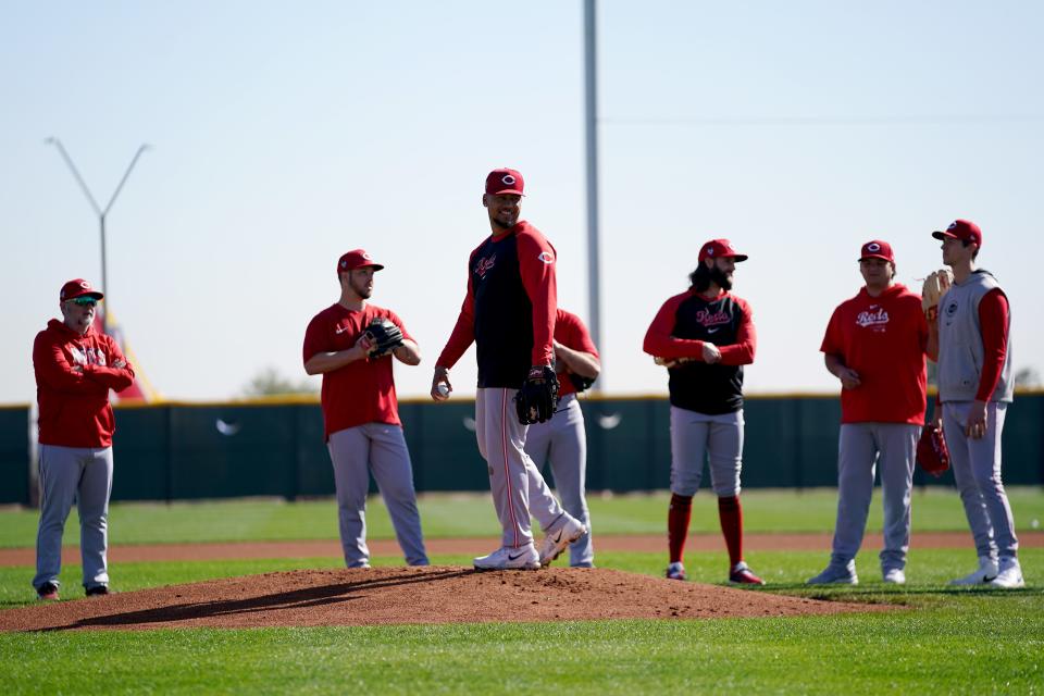 Frankie Montas, with teammates early in Reds spring training, knows what Noelvi Marte is going through after having been suspended 80 games for PED use. Montas was suspended himself when he was 26 with the Oakland A's.