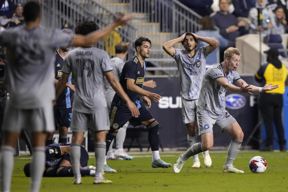 CF Montréal's Róbert Orri Þorkelsson, right, reacts after a call during the second half of an MLS soccer match against the Philadelphia Union, Saturday, June 3, 2023, in Chester, Pa. (AP Photo/Matt Slocum)