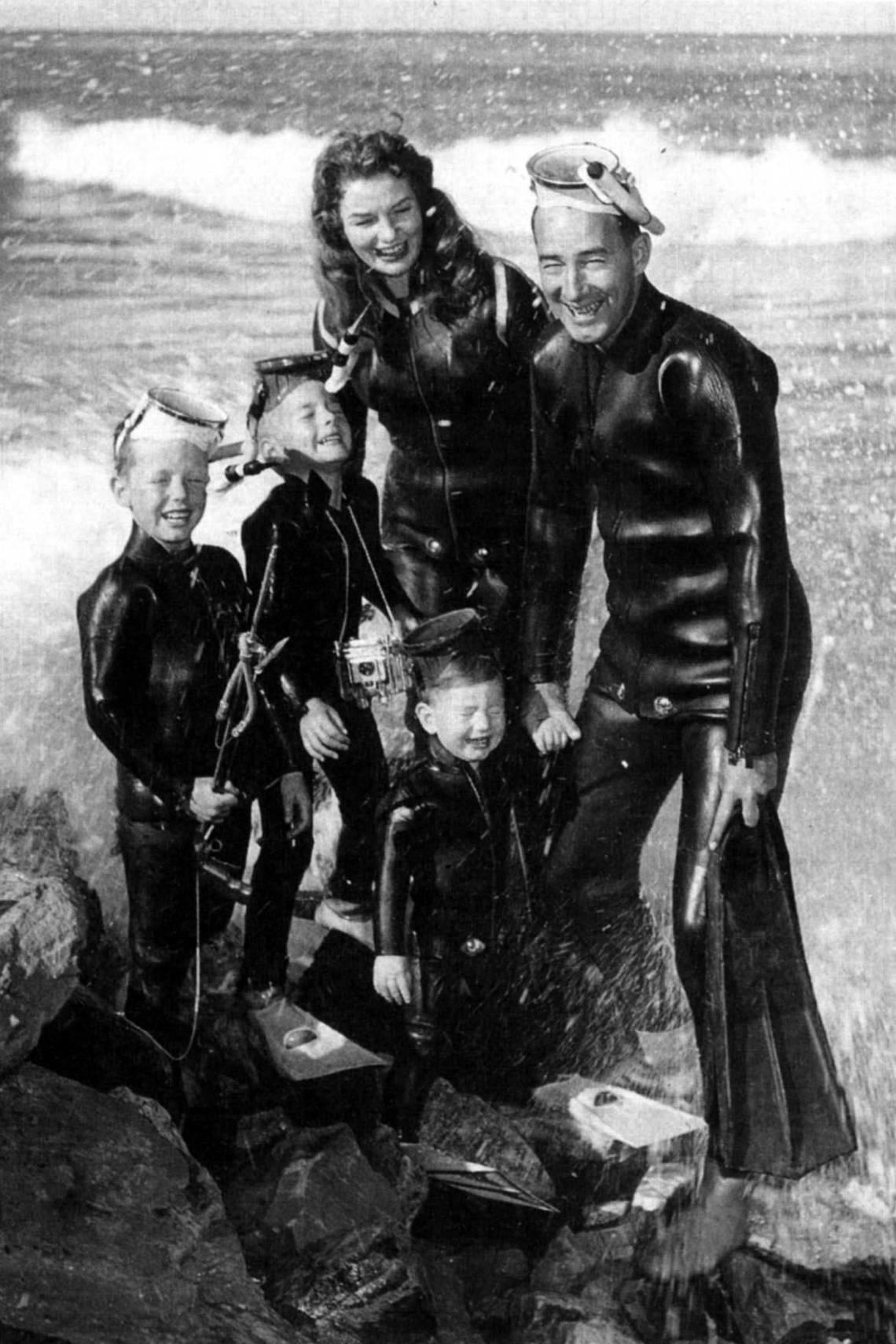 Scuba diving and treasure hunting have always been a family enterprise for the Fishers -- here Mel and Deo don wetsuits with their sons, Dirk, Kim and Kane.