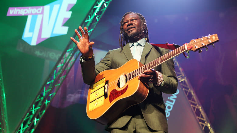 Levi Roots playing guitar