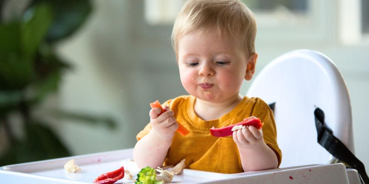 baby eating solid foods - starting solids, flavor window - Motherly