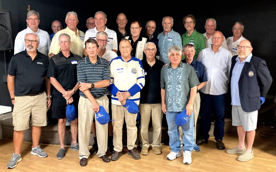 Former players and personnel for the Erie Lions, a semi-professional hockey team that competed from 1963-74, pose during Friday's team reunion at the Sunflower Club. Appearing from left to right are: (front row) Erik Hengelbrok, Mark Hogue, Terry Dunn, Bob Hammers, Ed Tropper, John Young, Ron Sciarrilli, Phil McCann, Dave Jerge and Mike Williams; (back row) Tim Wynne, Dan Griffin, Paul Greiner, Frank Myers, Ken Vokac, Rick Chartraw, John Chisholm, Dick Homovec, Chuck Blooming, Ron Hunt, Merle Falk and Mark Klimow.