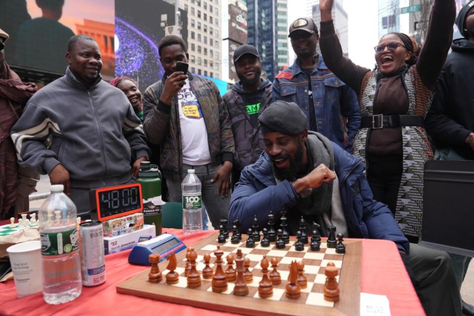 Chessmaster Tunde Onakoya took on a line-up of local players. James Keivom