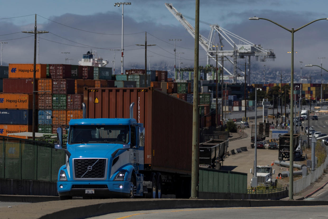 Shipping containers are seen at a terminal inside the Port of Oakland as truck drivers continue protesting against AB5, in Oakland, California, July 21, 2022. REUTERS/Carlos Barria