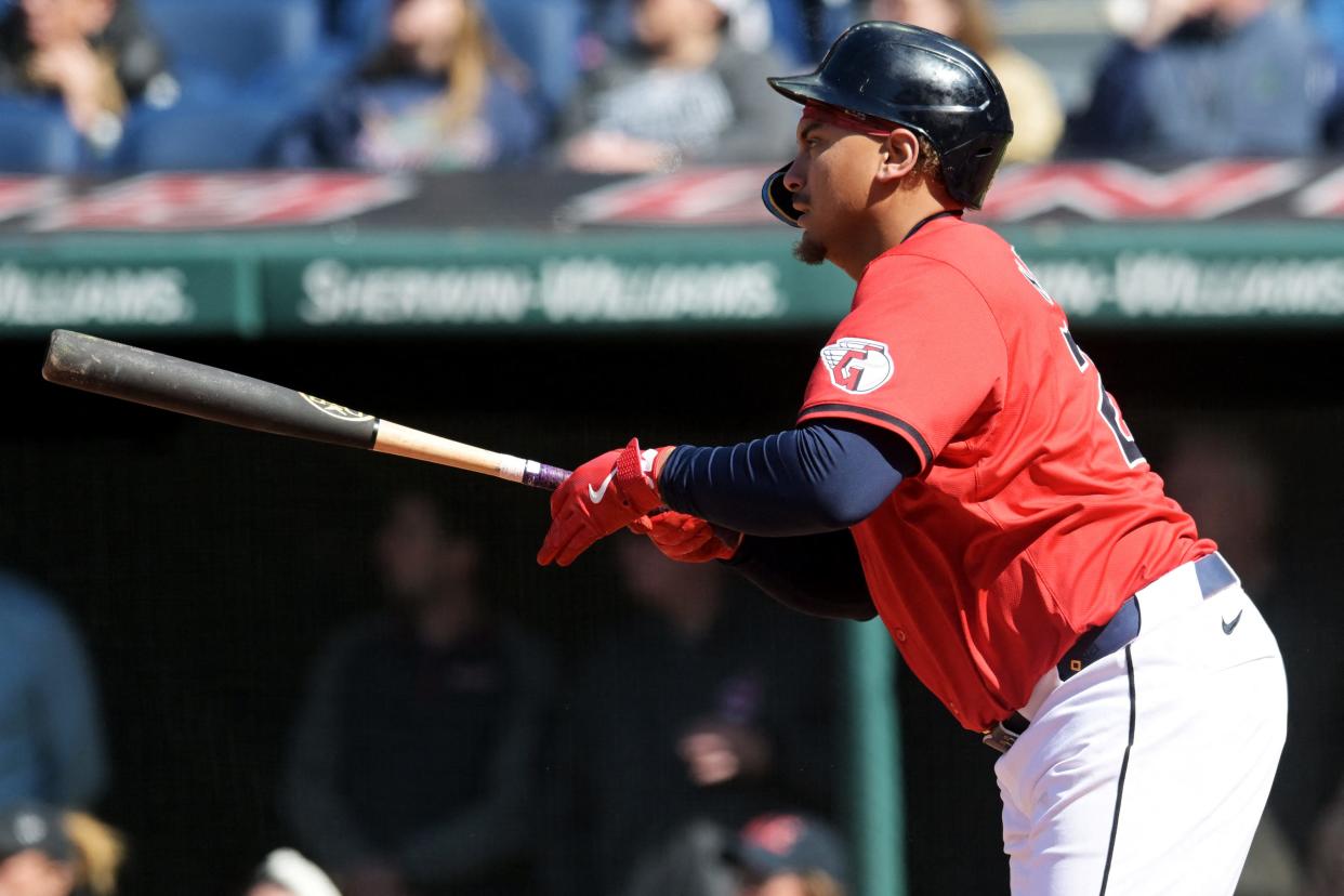 Guardians designated hitter Josh Naylor hits a three-run double during the seventh inning against the Oakland Athletics, April 21, 2024, in Cleveland.