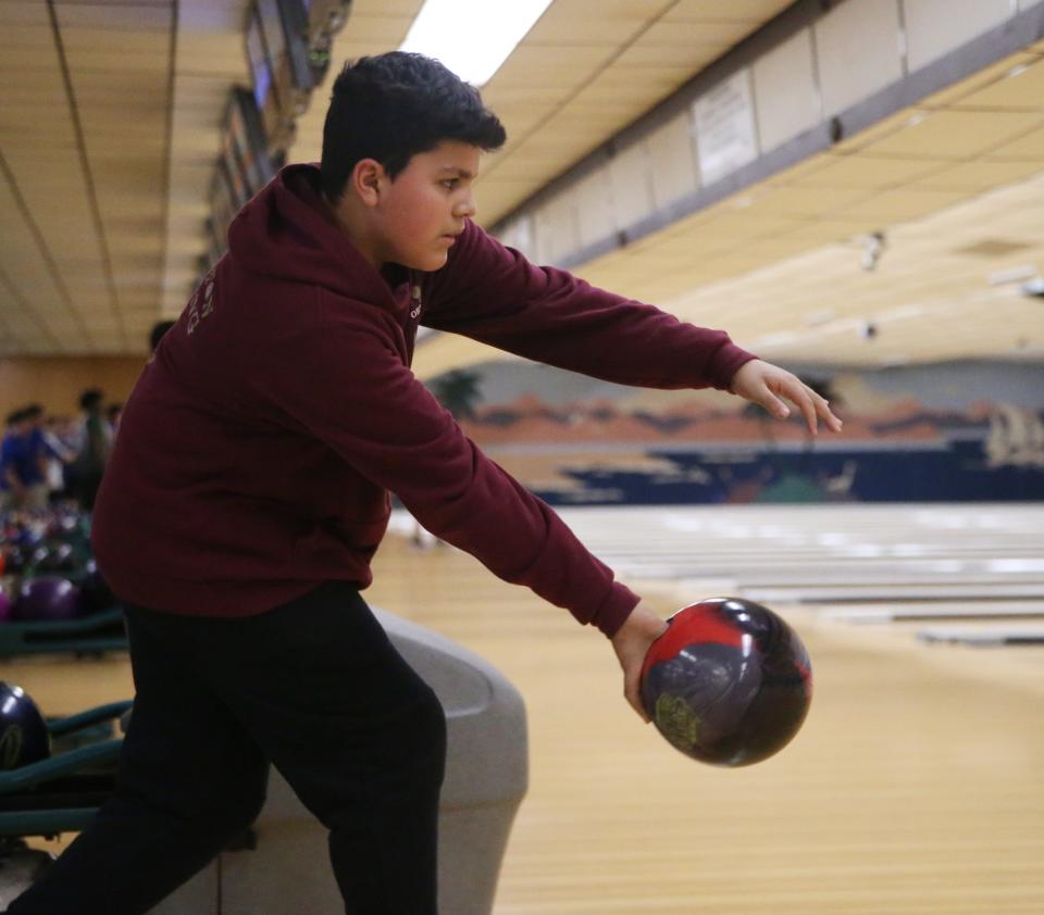 Arlington's Ivan Ortega bowls during the Section 1 bowling championships in Fishkill on February 14, 2023.