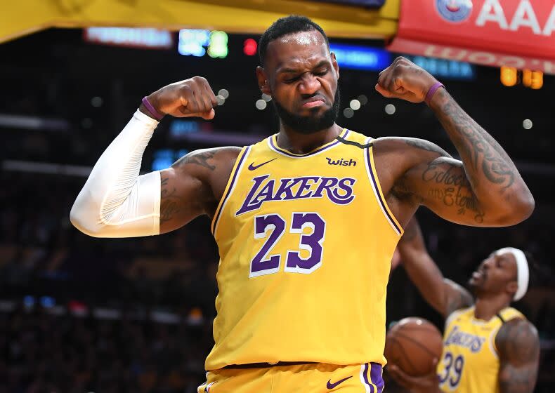 LOS ANGELES, CALIFORNIA JANUARY 7, 2020-Lakers LeBron James celebrates his basket and a foul by the Knicks at the Staples Center Tuesday. (Wally Skalij/Los Angerles Times)