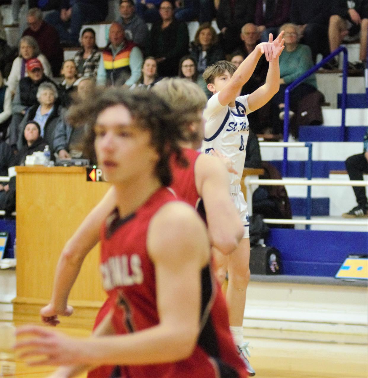 Daniel Jacobson shoots a 3-pointer during a boys basketball matchup between Gaylord St. Mary and Johannesburg-Lewiston on Thursday, Jan. 18.