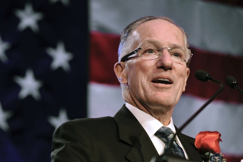 FILE - In this Dec. 12, 2011, file photo, Mike Emrick speaks after being inducted into the U.S. Hockey Hall of Fame.