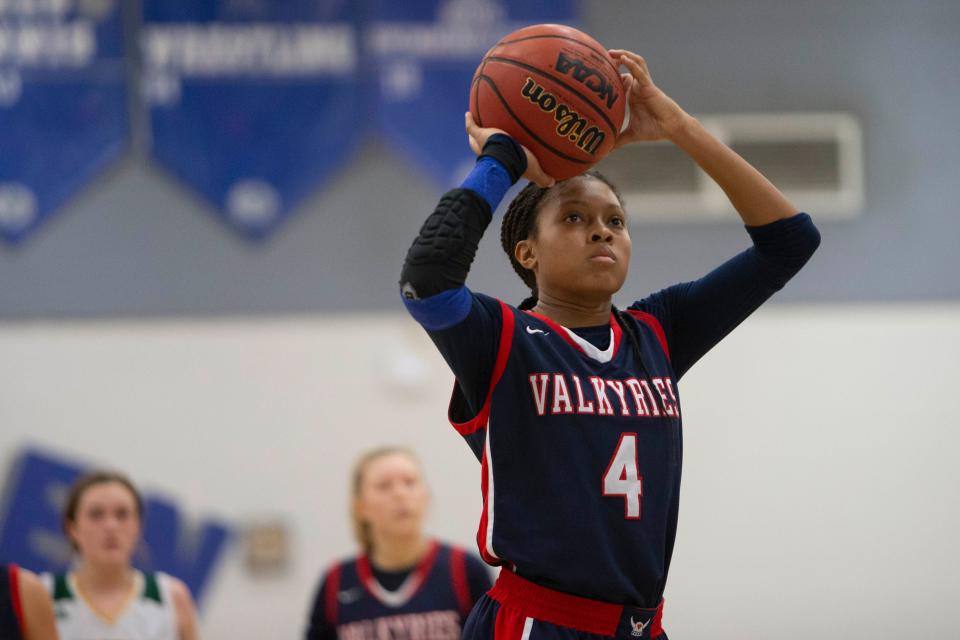 Sacred Heart's Triniti Ralston (4) shoots a free-throw during the Naples Holiday Shootout 2021 American Division championship between Sacred Heart Academy (Ky.) and Rock Bridge High School (Mo.), Thursday, Dec. 30, 2021, at Barron Collier High School in Naples, Fla.Rock Bridge defeated Sacred Heart 40-36 to win the Naples Holiday Shootout 2021 American Division championship.