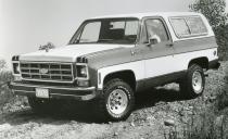 <p>In 1973, GM moved the Blazer to the new square-body design—a look it kept for another 18 years. The wheelbase grew slightly, and engineers carved out a roomier, more modern interior, but the trucks still used a full convertible roof until it was shortened to cover just the rear passengers and the cargo hold in 1976. One of our favorite models is the exceedingly rare 1976–1977 Chalet model. It's a factory camper that slept up to four in pure 1970s style. Through the second- generation's lifespan GM shoved everything under the hood from an inline-six to an optional 400-cubic-inch V-8, even a 6.2-liter diesel V-8—an engine used in M1009 military Blazers. </p>
