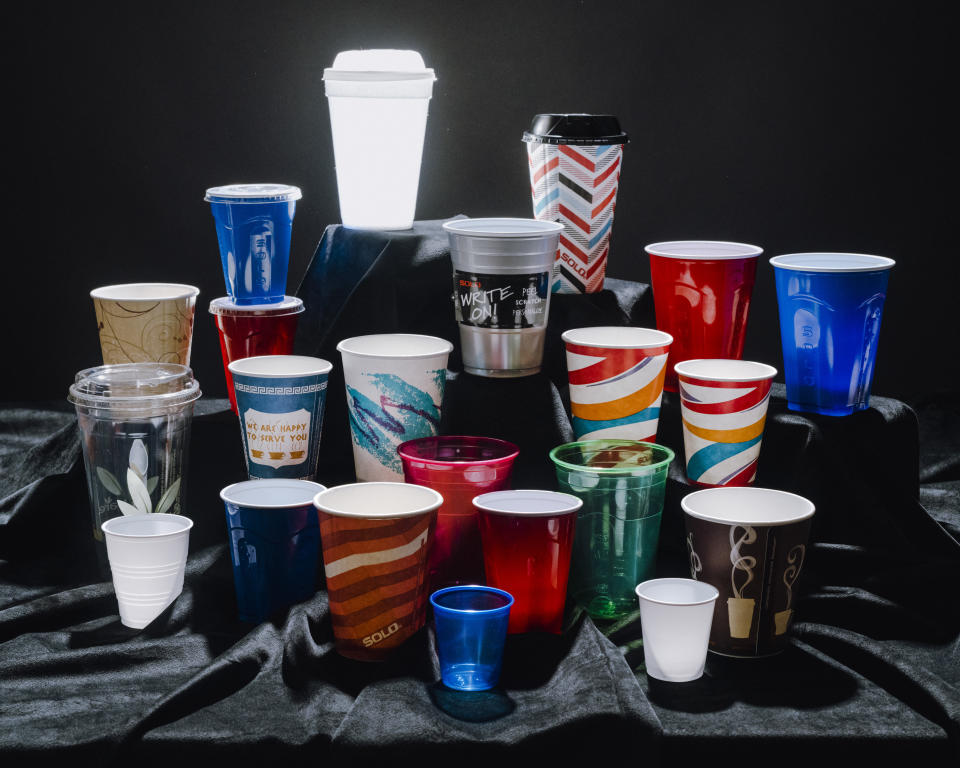 Various Dart brand cups sit on a table in Chicago on Oct. 25, 2019. The Dart Container Corporation, which makes foam products, is a manufacturing behemoth and produced a fortune for the family behind it but environmentalists say its products are polluting the globe. (Lyndon French/The New York Times)