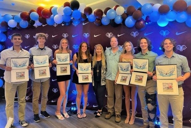 LEGACY SCHOLARSHIPS: The Andrew Monroe Memorial Scholarship Fund recently awarded eight scholarships during the Riverview High School Soccer Awards ceremony at the Hyatt Regency in Sarasota. From left, Mateo Rizzo, Cameron Fortier, Emelie Selberg, Taylor Simone, Stacey Monroe, Samuel Monroe, Maliah Camille Jones, Phillip Marrs, and Gustavo Trope Mayer (not pictured Jack Bates). The scholarship fund to assist Riverside soccer athletes was created following Monroe’s death in a 2011 car crash. For information, visit andrewmonroe.com.