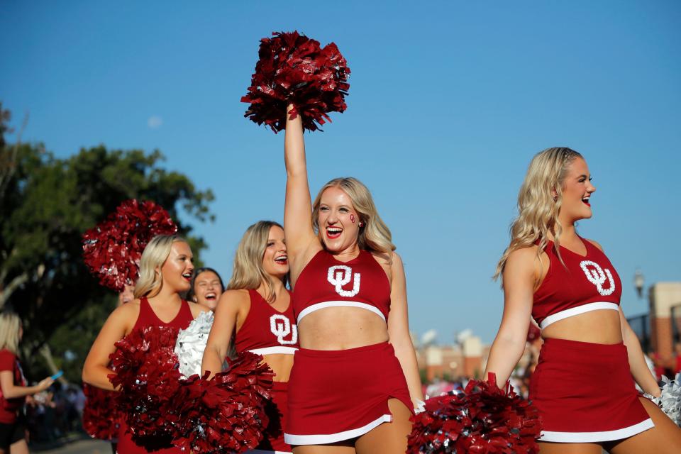 OU cheer members arrive before a college football game between the University of Oklahoma Sooners (OU) and the Arkansas State Red Wolves at Gaylord Family-Oklahoma Memorial Stadium in Norman, Okla., Saturday, Sept. 2, 2023.