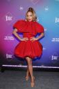 <p>Lopez looked red hot in a mini pouf dress by Christian Siriano to accept the 2020 People's Icon Award at the People's Choice Awards. </p>