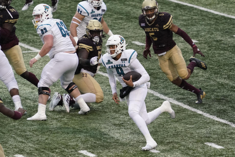 Coastal Carolina's Fred Payton (9) runs against Texas State during the second half of an NCAA college football game in San Marcos, Texas, Saturday, Nov. 28, 2020. (AP Photo/Chuck Burton)