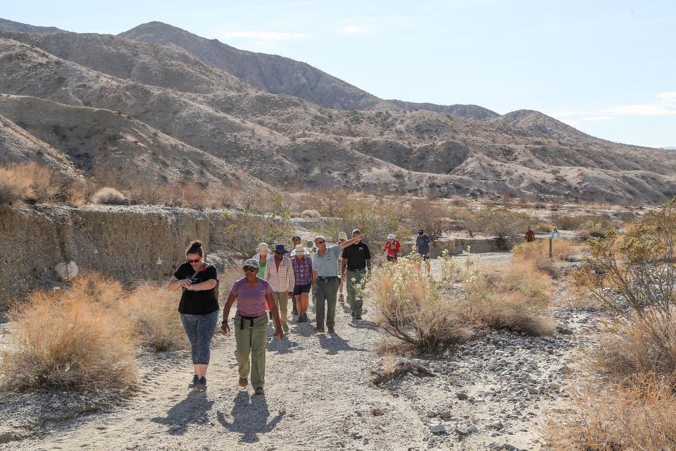 A group hikes the Long Canyon Trail which starts in Desert Hot Springs and ends in Joshua Tree National Park, December 3, 2021. 