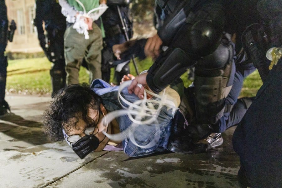 LOS ANGELES, CALIFORNIA – MAY 2: US Police arrests a Pro-Palestinian demonstrator as the people protest at UCLA, in Los Angeles, California, USA on May 2, 2024. (Photo by Grace Yoon/Anadolu via Getty Images)