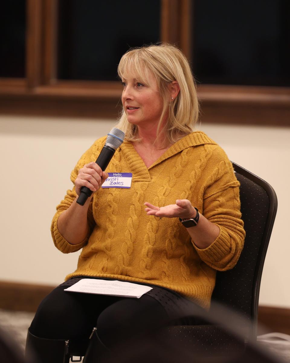 Christie Bates, a teacher at Holden Elementary School in Kent, gives her perspective on race and education during a community event Tuesday evening.