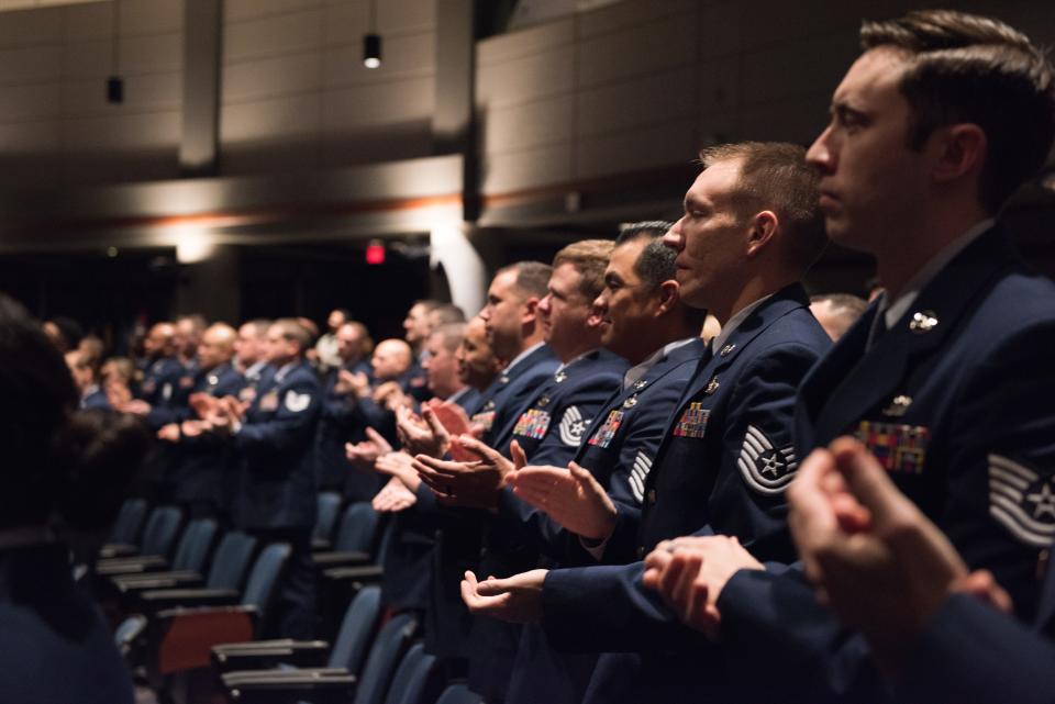 Air Force Noncommissioned Officer Academy students applaud during their graduation ceremony on Maxwell Air Force Base - Gunter Annex, Ala. The Gunter NCO Academy, which reopened in April 2019 to become the temporary home of the Airey NCO Academy after Hurricane Michael, is closing indefinitely once the current class graduates on May 12.