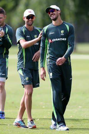 Cricket - Australia Nets - Old Merchant Taylors’ School, Northwood - 21/6/15 Australia's Nathan Lyon (L) and Mitchell Starc during nets Action Images via Reuters / Alex Morton Livepic