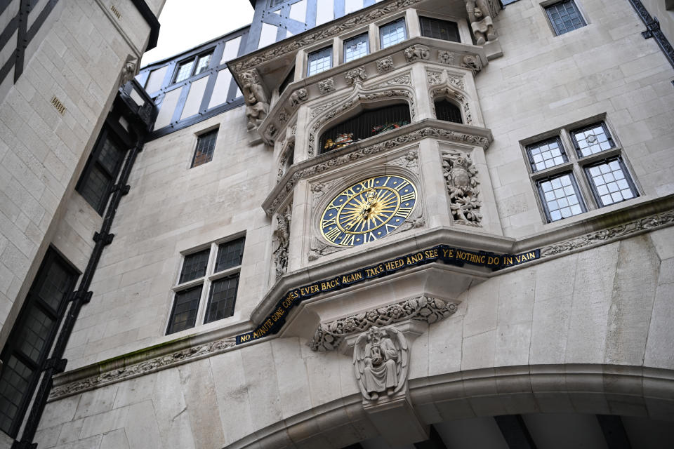 Looking up from street level at the clock outside Libertys London