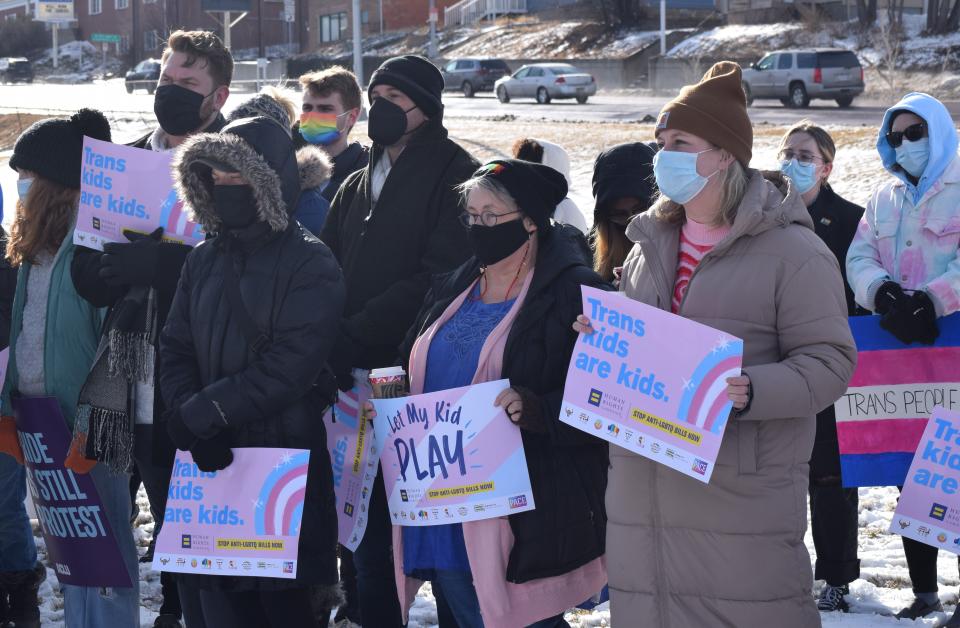 More than three dozen protestors stood at Van Eps Park as part of a "Protect Trans Kids rally" in Sioux Falls on Sunday afternoon, Jan. 16, 2022 in support of transgender rights, and in opposition to three bills filed in the South Dakota Legislature that they say are anti-transgender.