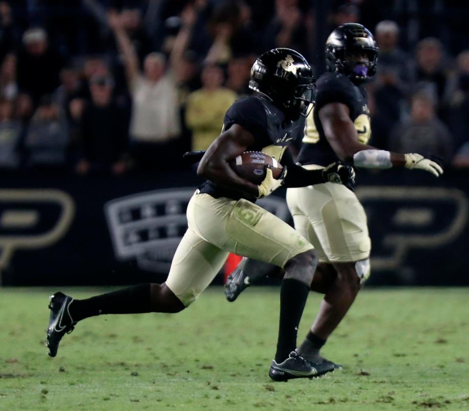 Purdue Boilermakers safety Sanoussi Kane (21) recovers a fumble during the NCAA football game against the Florida Atlantic Owls, Saturday, Sept. 24, 2022, at Ross-Ade Stadium in West Lafayette, Ind. Purdue won 28-26.