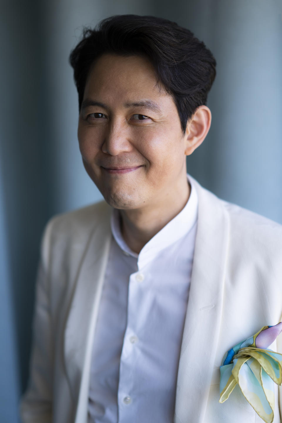 Lee Jung-jae poses for portrait photographs for the film 'Hunt, at the 75th international film festival, Cannes, southern France, Thursday, May 19, 2022. (Photo by Joel Ryan/Invision/AP)